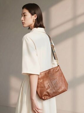 Classic Tan Leather Shoulder Bag with Patterned Strap